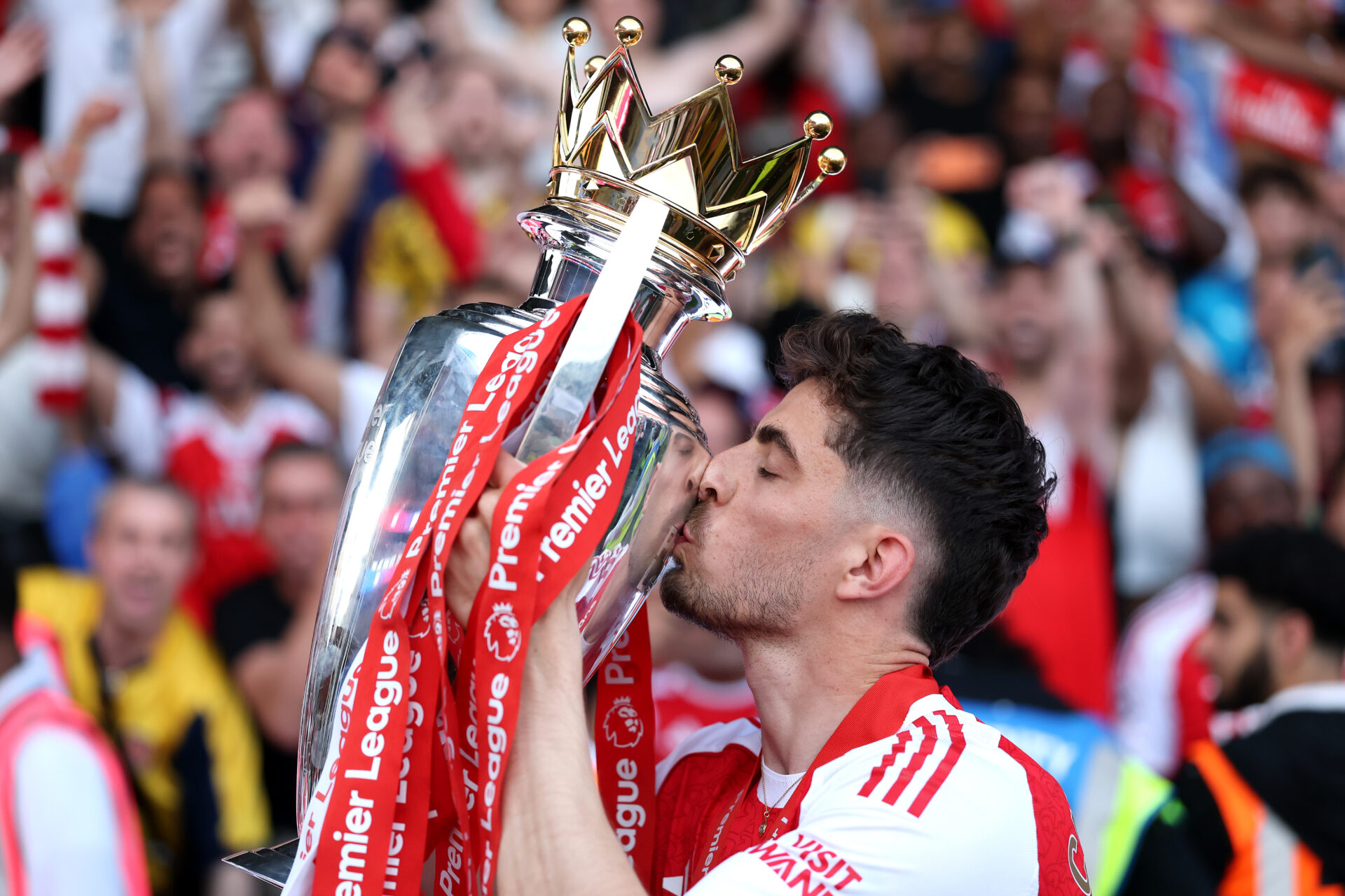 Best photos as Arsenal lift Premier League trophy 8 LONDON, ENGLAND - MAY 24: Kai Havertz of Arsenal kisses the Premier League trophy, as Arsenal are crowned the Champions of the Premier League for the 2025/26 Season, after the Premier League match between Crystal Palace and Arsenal at Selhurst Park on May 24, 2026 in London, England. (Photo by Justin Setterfield/Getty Images)