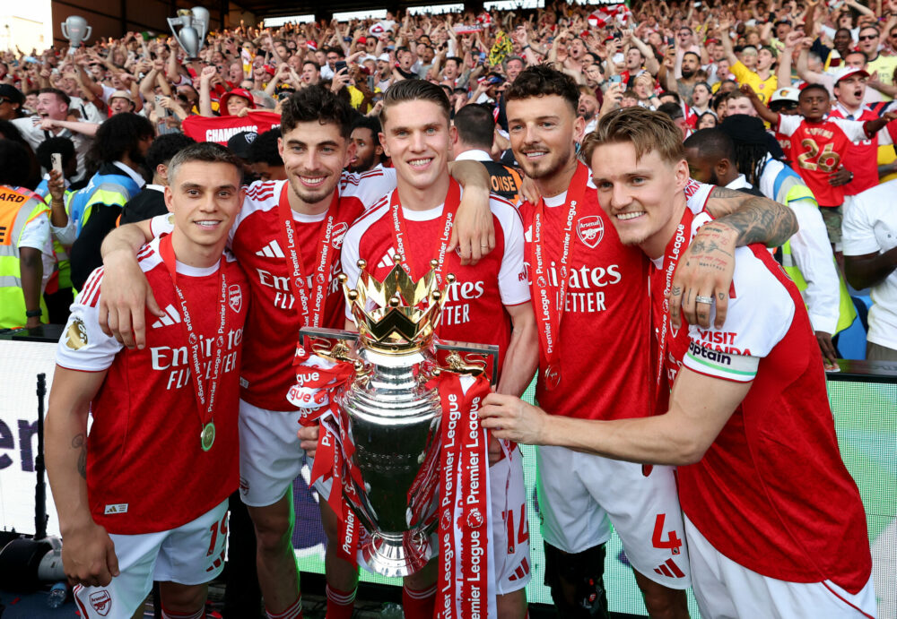 Best photos as Arsenal lift Premier League trophy 10 LONDON, ENGLAND - MAY 24: Leandro Trossard, Kai Havertz, Viktor Gyoekeres, Ben White and Martin Odegaard of Arsenal pose for a photograph the Premier League trophy as players of Arsenal celebrate, as they are crowned the Champions of the Premier League for the 2025/26 Season, after the Premier League match between Crystal Palace and Arsenal at Selhurst Park on May 24, 2026 in London, England. (Photo by Michael Regan/Getty Images For Premier League)