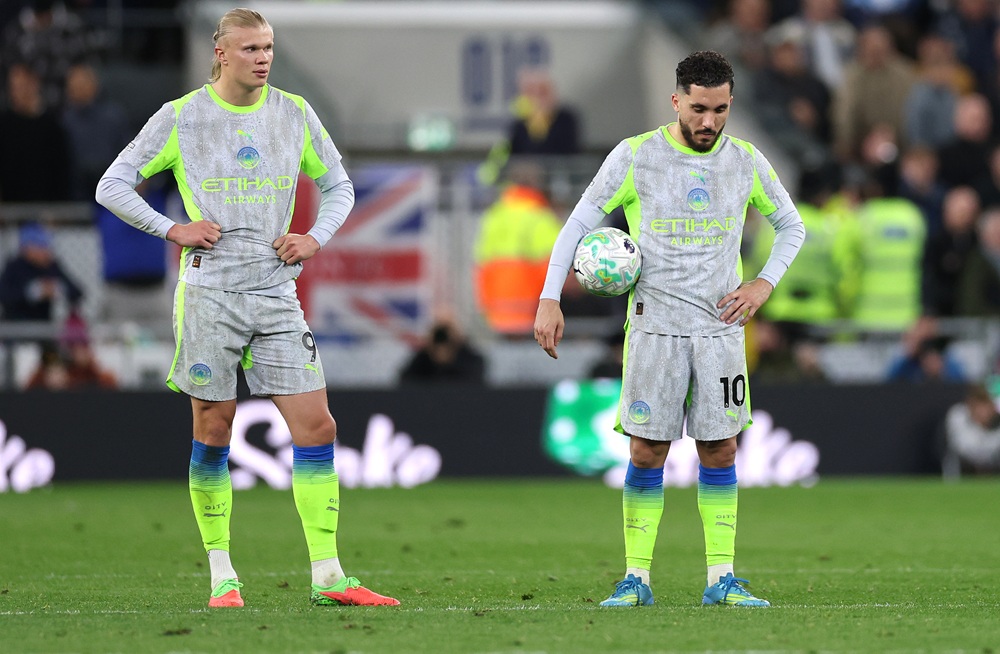 Manchester City players Erling Haaland (l) and Rayan Cherki react after the third Everton goal during the Premier League match between Everton and Manchester City at Hill Dickinson Stadium on May 04, 2026 in Liverpool, England. (Photo by Stu Forster/Getty Images)