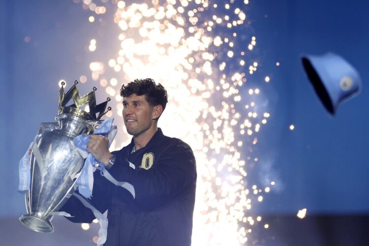 John Stones of Manchester City brings out the 2018/2019 Premier League trophy during the After Party Celebration to mark the achievements of Manche...