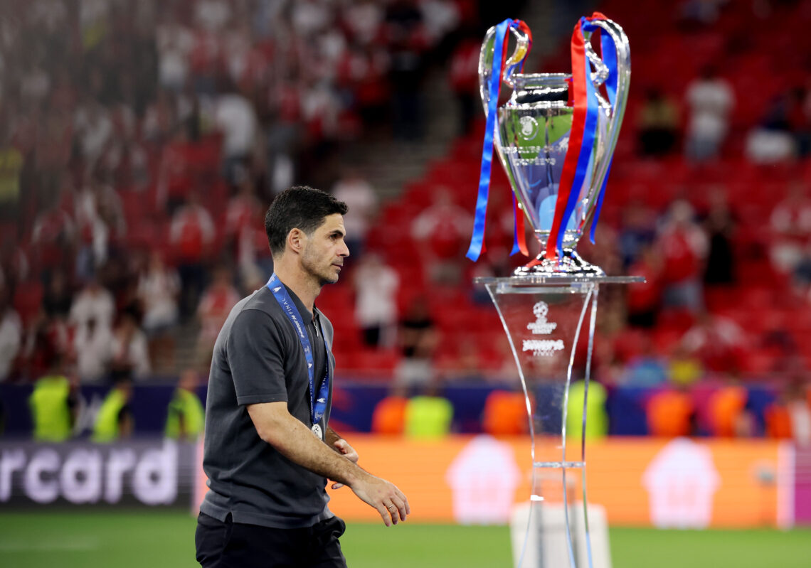 Mikel Arteta, Manager of Arsenal, walks past the UEFA Champions League trophy following the UEFA Champions League Final 2026 match between Paris Sa...