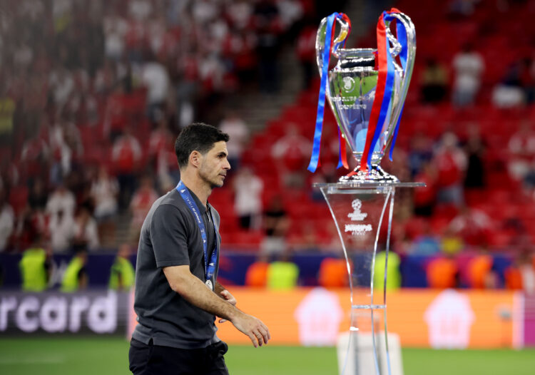 Mikel Arteta, Manager of Arsenal, walks past the UEFA Champions League trophy following the UEFA Champions League Final 2026 match between Paris Sa...