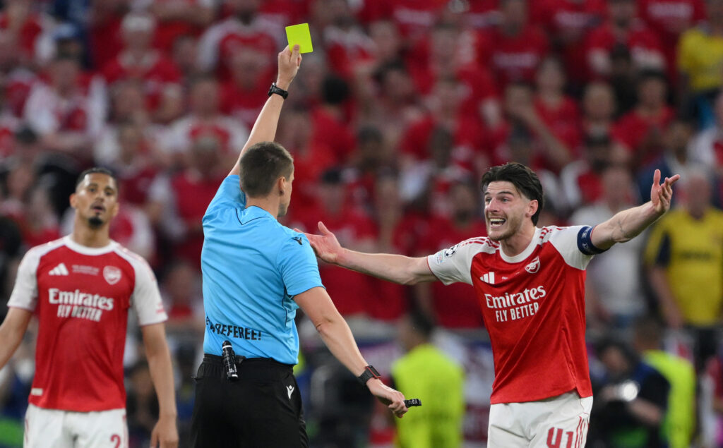 Declan Rice of Arsenal reacts as the Referee shows him a yellow card during the UEFA Champions League Final 2026 match between Paris Saint-Germain and Arsenal FC at Puskas Arena on May 30, 2026 in Budapest, Hungary.