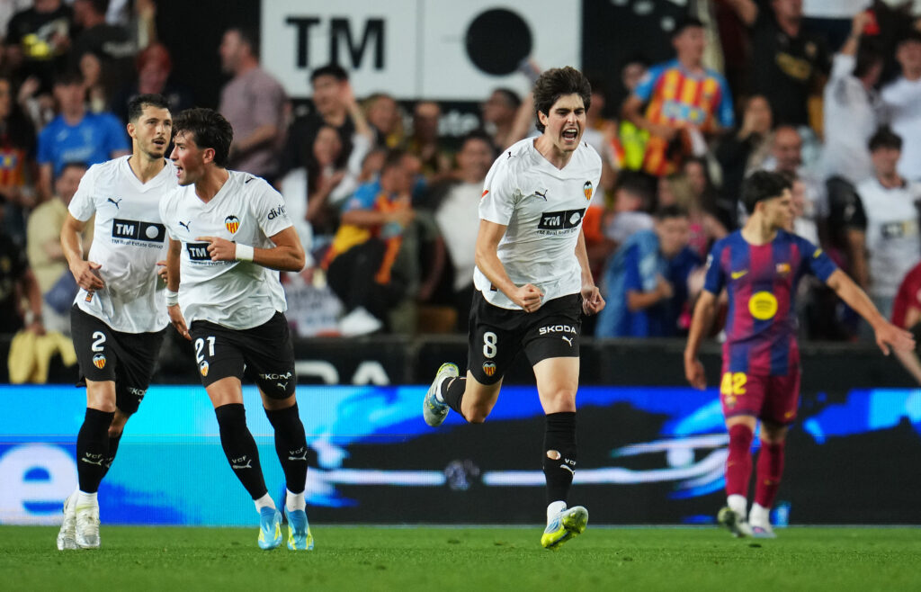 Javi Guerra of Valencia CF celebrates scoring his team's first goal during the LaLiga EA Sports match between Valencia CF and FC Barcelona at Estadi de Mestalla on May 23, 2026 in Valencia, Spain.
