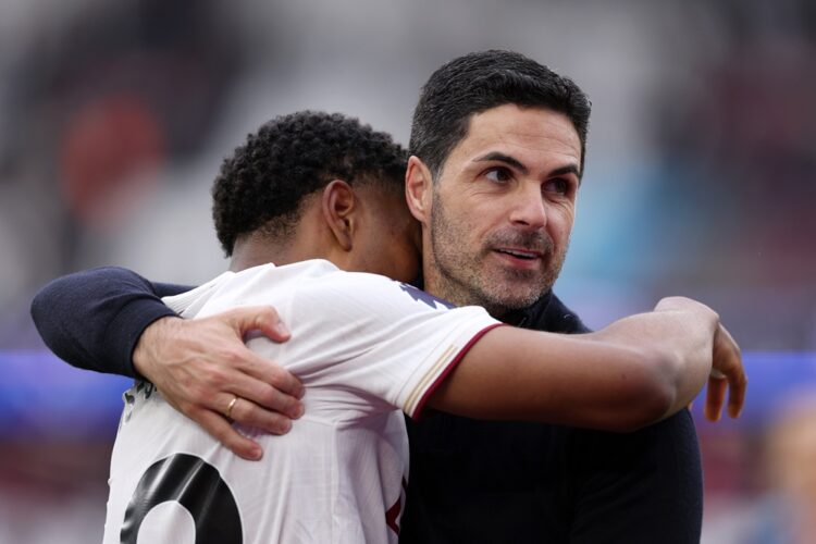 Myles Lewis-Skelly of Arsenal embraces Mikel Arteta, Manager of Arsenal, at full time following victory during the Premier League match between Wes...