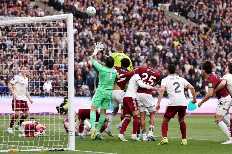 Pablo of West Ham United fouls David Raya of Arsenal before Callum Wilson (not pictured) scores a goal that is later disallowed following VAR revie...