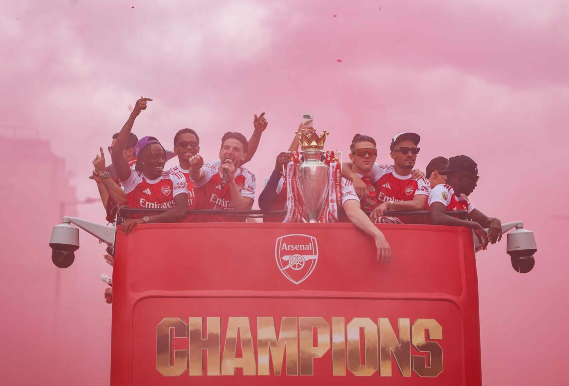 Declan Rice sings to the crowd as the Arsenal team celebrate on the bus as it passes through the streets of London with the Premier League Trophy d...