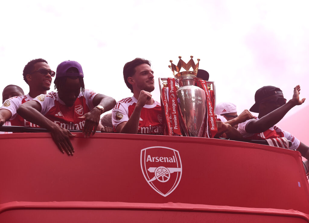Declan Rice of Arsenal celebrates with the Premier League trophy aboard their open top bus on May 31, 2026 in Islington, England. Arsenal clinched their first Premier League title in 22 years earlier this month