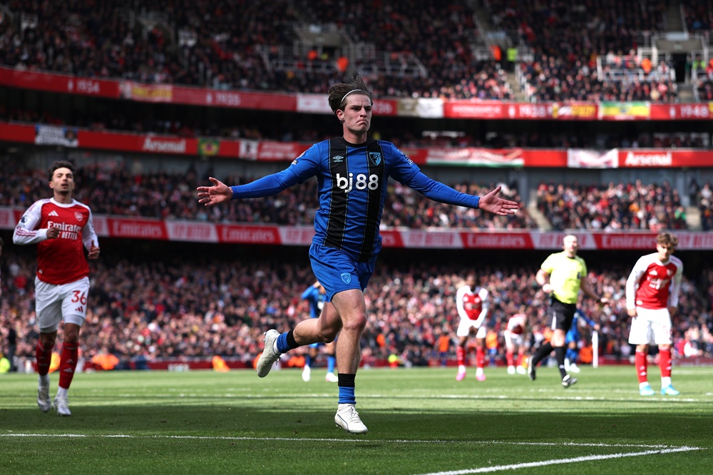Alex Scott of AFC Bournemouth celebrates scoring his team's second goal during the Premier League match between Arsenal and Bournemouth at Emirates Stadium on April 11, 2026 in London, England. (Photo by Justin Setterfield/Getty Images)