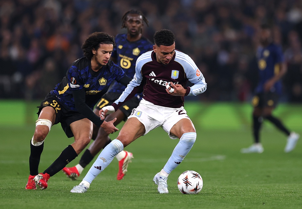 Arsenal competing with PSG for Lille signing 2 Morgan Rogers of Aston Villa is challenged by Ayyoub Bouaddi of LOSC Lille during the UEFA Europa League 2025/26 Round of 16 Second Leg match between Aston Villa FC and Lille OSC at Villa Park on March 19, 2026 in Birmingham, England. (Photo by Kate McShane/Getty Images)