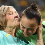 Caitlin Foord of Australia receives a kiss from her grandmother during a presentation for her 150th appearance during the women's international friendly match between Australia Matildas and Mexico at CommBank Stadium on June 09, 2026 in Sydney