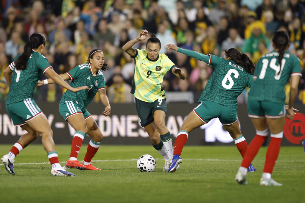 Caitlin Foord of Australia takes on the defence during the women's international friendly match between Australia Matildas and Mexico at McDonald Jones Stadium on June 06