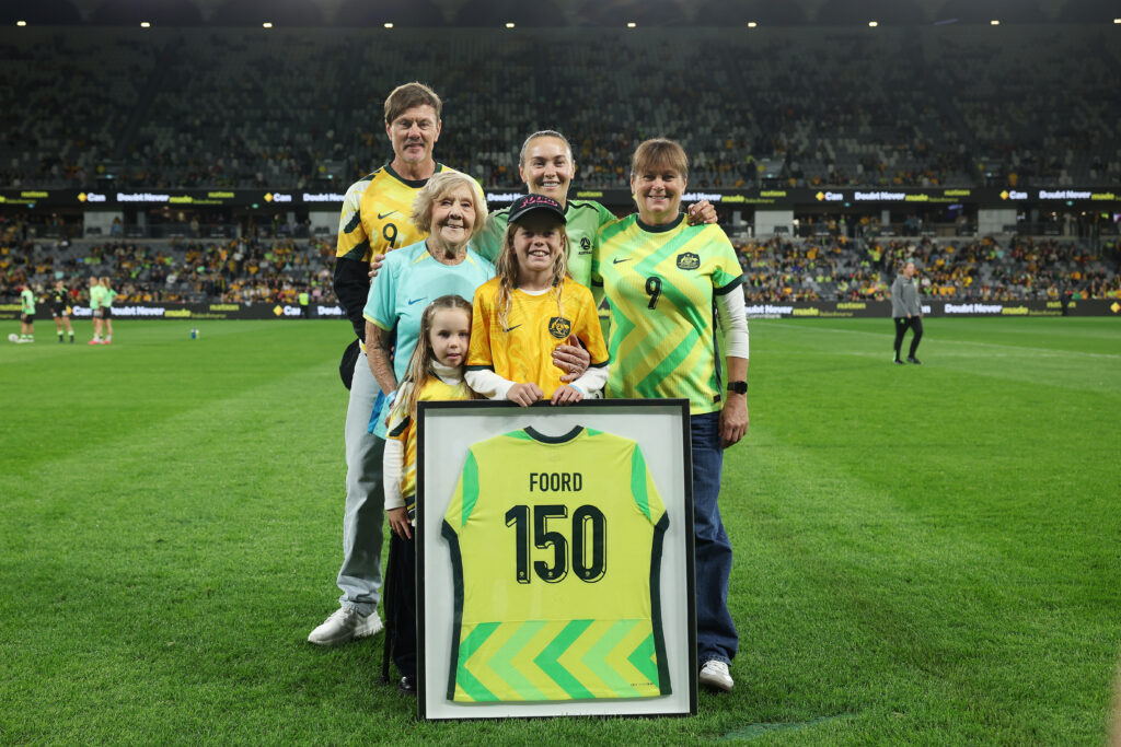Caitlin Foord of Australia poses with family during the women's international friendly match between Australia Matildas and Mexico at CommBank Stadium on June 09, 2026 in Sydney, Australia.