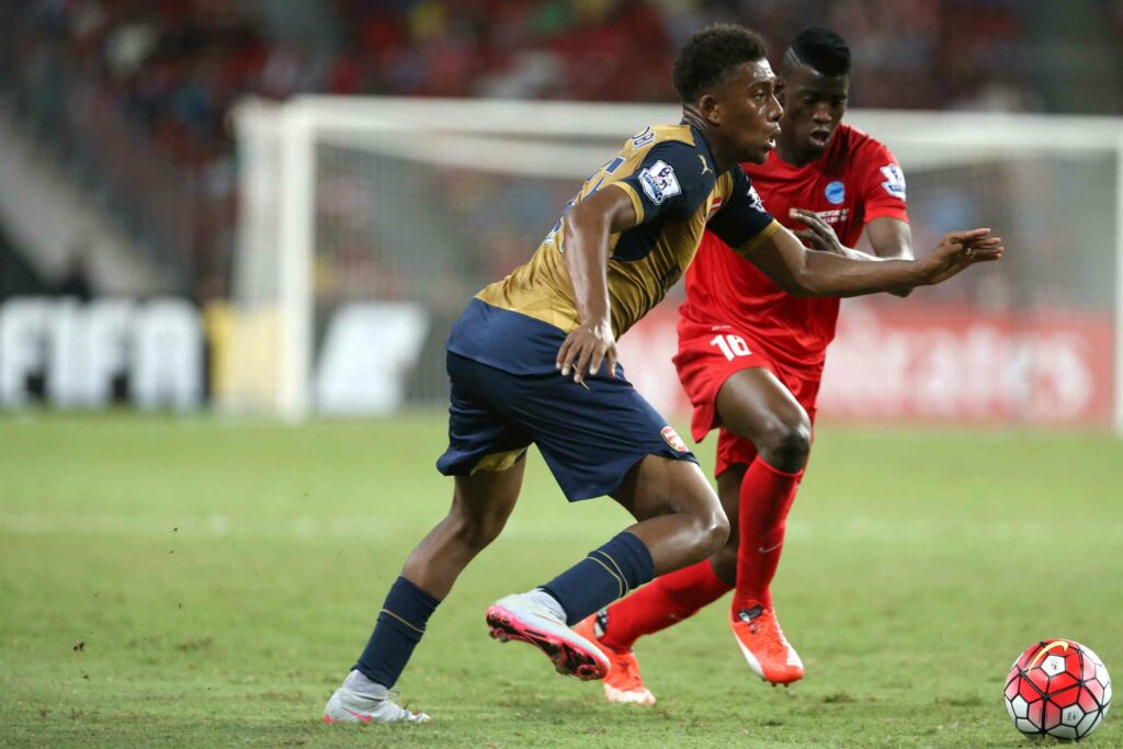 Alex Iwobi of Arsenal vies for the ball during the Barclays Asia Trophy match between Arsenal and Singapore Select XI at National Stadium on July 15, 2015 in Singapore.