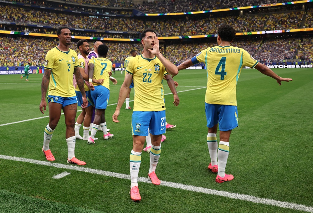 Gabriel Martinelli #22 of Brazil celebrates with teammates after scoring the team's second goal during the FIFA World Cup 2026 Round Of 32 match between Brazil and Japan at Houston Stadium on June 29, 2026 in Houston, Texas. (Photo by Lars Baron/Getty Images)