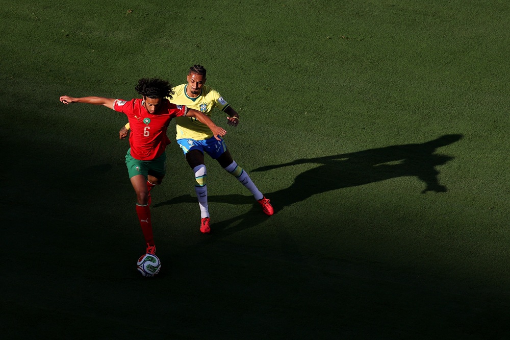 Ayyoub Bouaddi #6 of Morocco is challenged by Raphinha #11 of Brazil during the FIFA World Cup 2026 Group C match between Brazil and Morocco at New York New Jersey Stadium on June 13, 2026 in East Rutherford, New Jersey. (Photo by Al Bello/Getty Images)