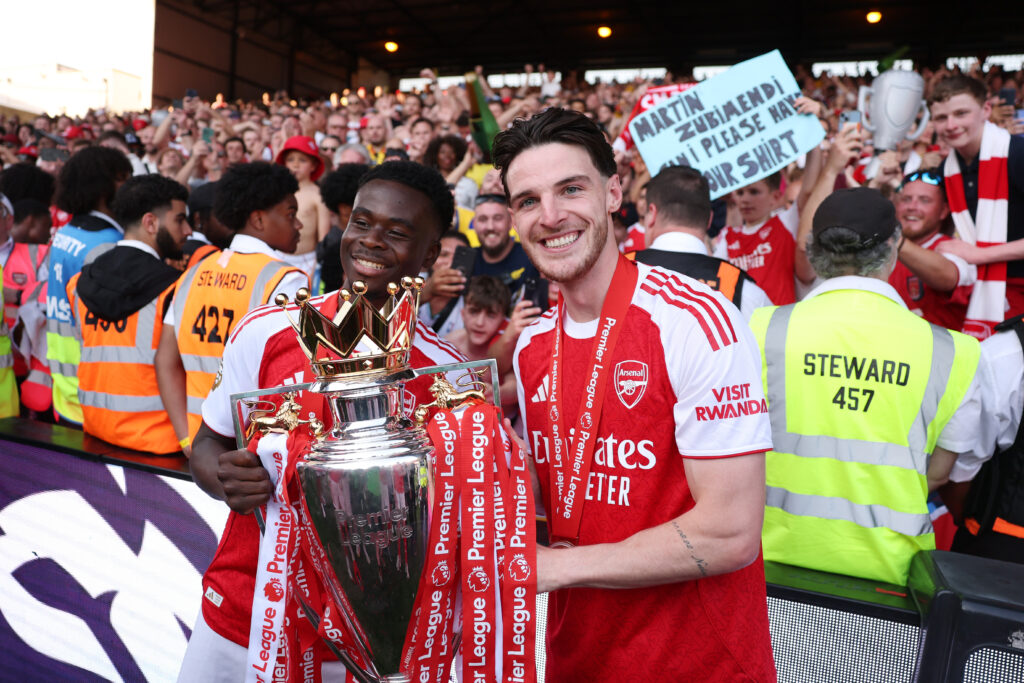 Declan Rice says his mum “killed” him over England sunburn 4 Bukayo Saka and Declan Rice of Arsenal pose for a photograph the Premier League trophy as players of Arsenal celebrate, as they are crowned the Champions of the Premier League for the 2025/26 Season, after the Premier League match between Crystal Palace and Arsenal at Selhurst Park