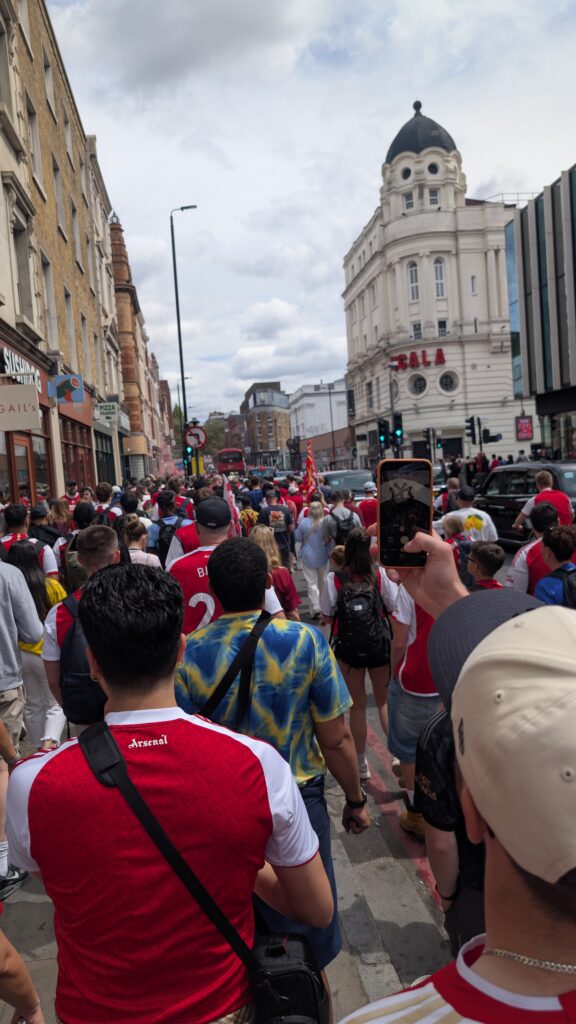 Arsenal fans making their way en masse to the Champions parade, 31 May 2026
