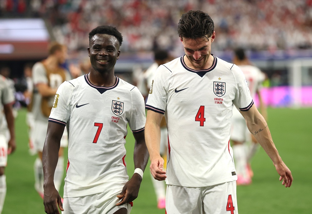 Bukayo Saka #7 and Declan Rice #4 of England react after the 4-2 win during the FIFA World Cup 2026 Group L match between England and Croatia at Da...