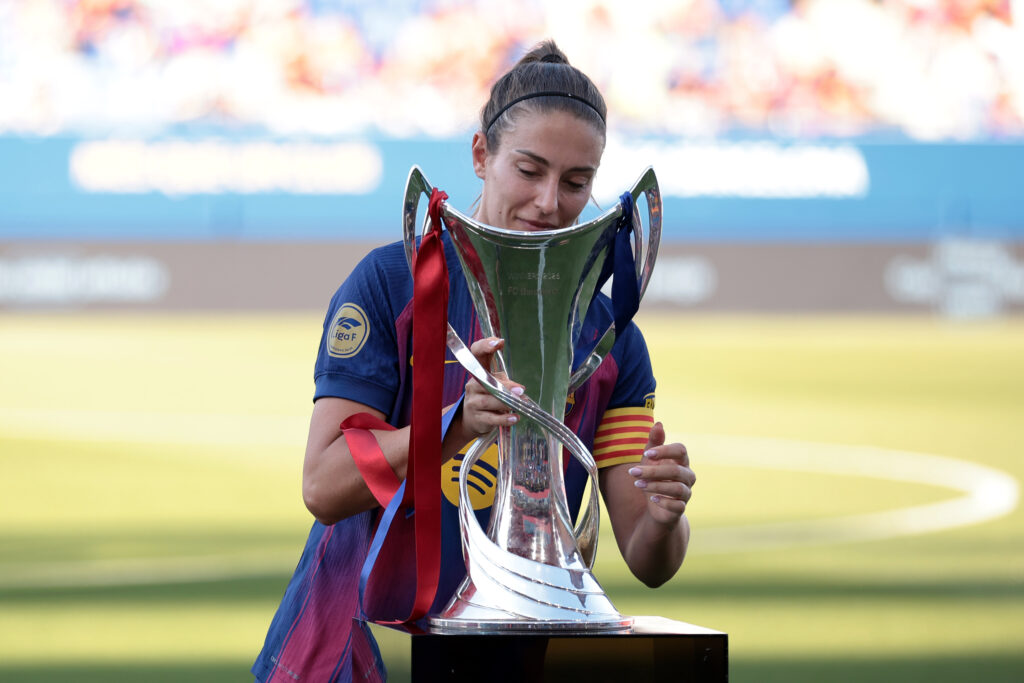 Alexia Putellas of FC Barcelona celebrates with the UEFA Women's Champions League trophy prior to the Liga F match between FC Barcelona Femení and Real Sociedad Femenino