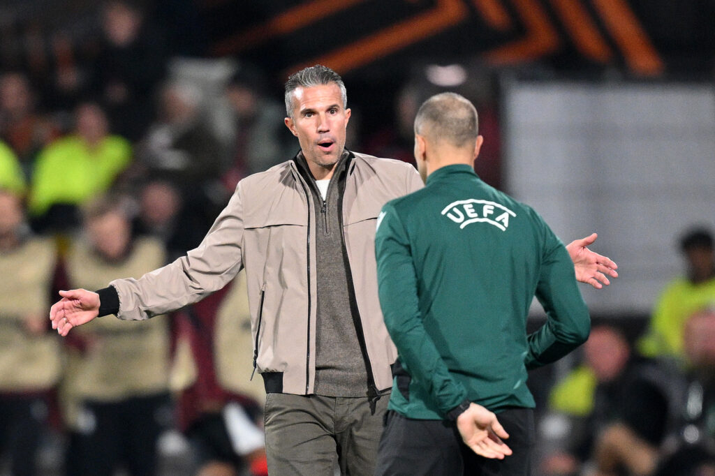 Robin Van Persie, Head Coach of Feyenoord, reacts towards the fourth official during the UEFA Europa League 2025/26 League Phase MD2 match between Feyenoord and Aston Villa FC