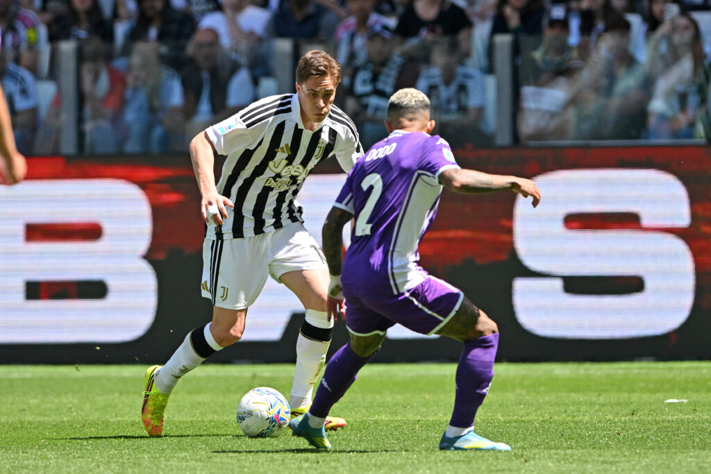 Kenan Yildiz of Juventus FC runs at Dodo of ACF Fiorentina during the Serie A match between Juventus FC and ACF Fiorentina at Allianz Stadium