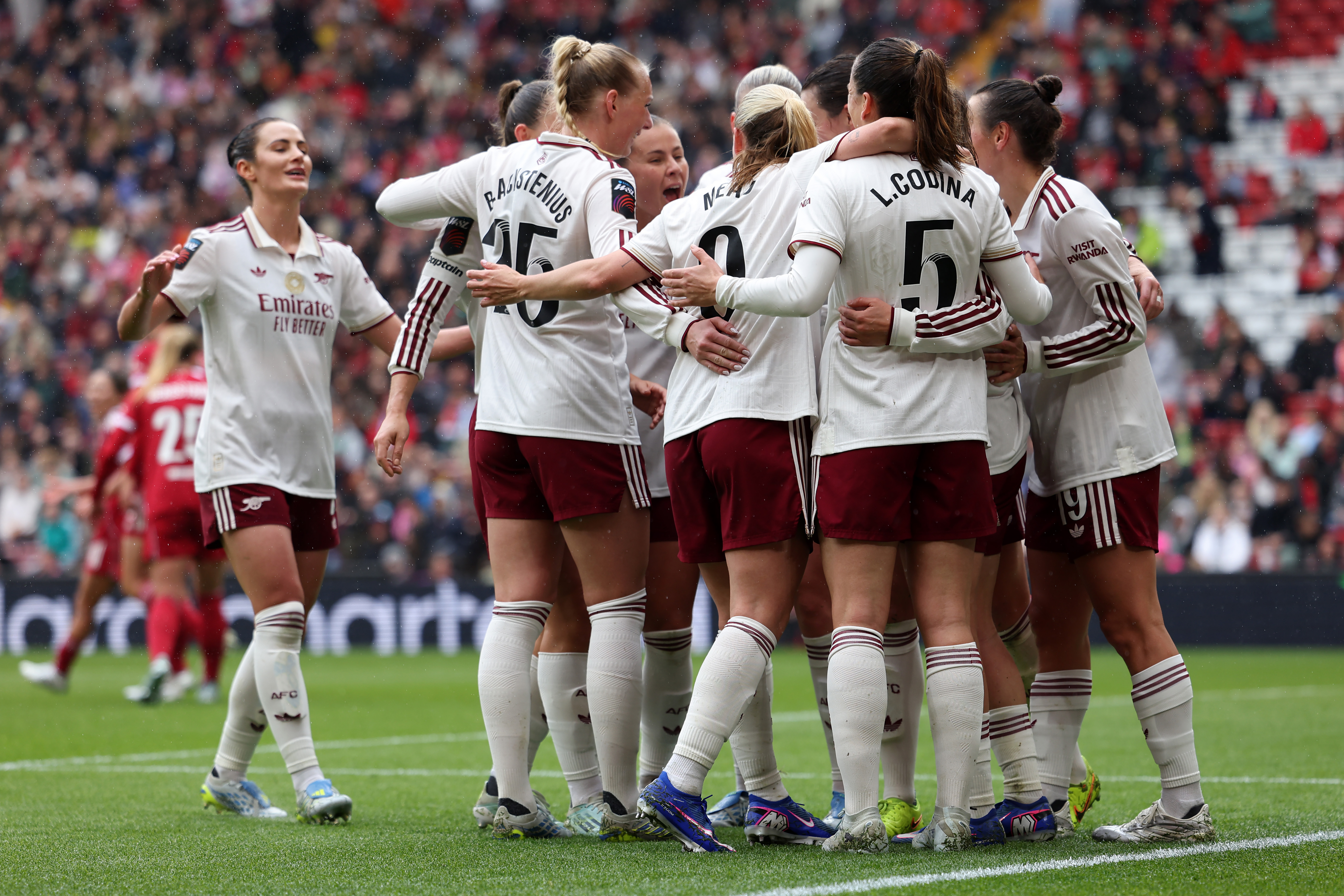 What size should the Arsenal Women squad be for the 2026/27 season? 2 Mariona Caldentey of Arsenal (obscured) celebrates scoring her team's second goal with teammates during the Barclays Women's Super League match between Liverpool and Arsenal at Anfield