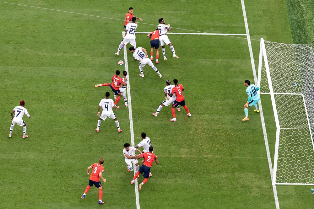 Jude Bellingham #10 of England scores scoring the team's first goal against Orlando Mosquera #22 of Panama during the FIFA World Cup 2026 Group L match between Panama and England at New York New Jersey Stadium on June 27, 2026 in East Rutherford, New Jersey.  (Photo by Al Bello/Getty Images)