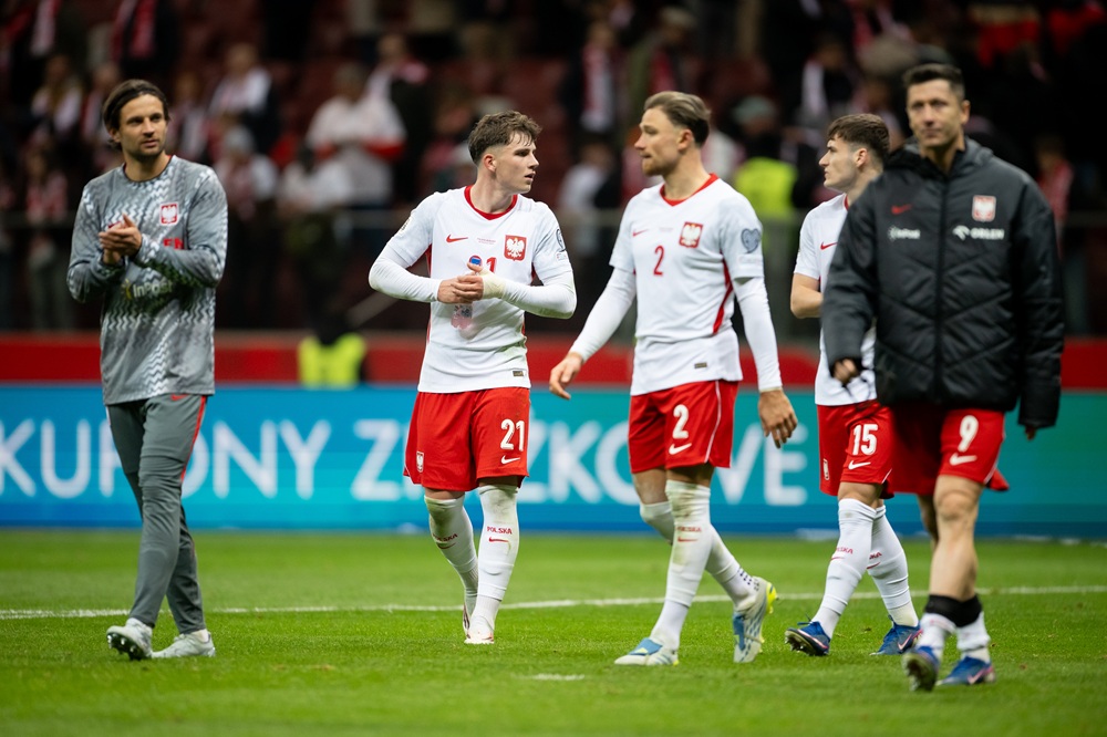 Oskar Pietuszewski of Poland celebrates after the team's victory during the FIFA World Cup 2026 European Qualifiers KO play-offs match between Poland and Albania at PGE Narodowy on March 26, 2026 in Warsaw, Poland. (Photo by Mateusz Slodkowski/Getty Images)