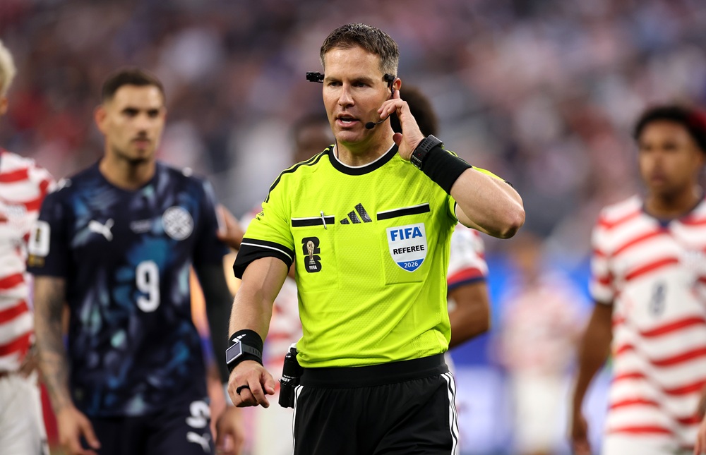 Referee Danny Makkelie looks on as a VAR check is underway for 'mistaken identify' involving an tackle between Miguel Almiron #10 of Paraguay and Tim Ream #13 of the United States during the FIFA World Cup 2026 Group D match between USA and Paraguay at Los Angeles Stadium on June 12, 2026 in Los Angeles, California. (Photo by Richard Heathcote/Getty Images)