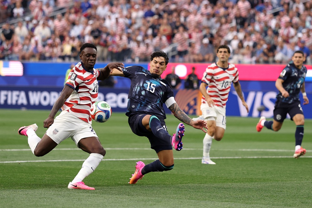 Former Gunner with sell-on clause scores World Cup brace 3 Folarin Balogun of the United States shoots under pressure from Gustavo Gomez of Paraguay during the FIFA World Cup 2026 Group D match between USA and Paraguay at Los Angeles Stadium on June 12, 2026 in Los Angeles, California. (Photo by Richard Heathcote/Getty Images)