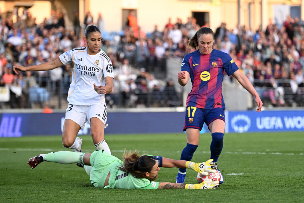 Misa Rodriguez of Real Madrid CF saves at the feet of Ewa Pajor of FC Barcelona during the UEFA Women's Champions League 2025/26 Quarter-finals