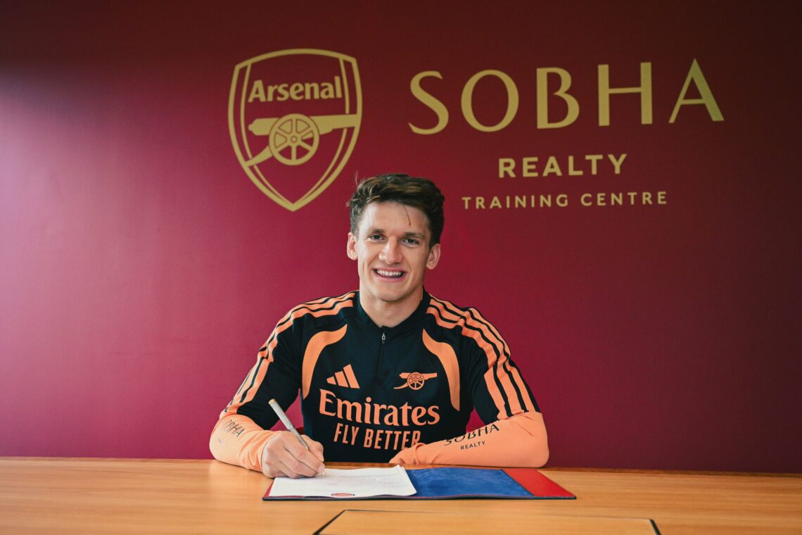 Christos Tzolis signing for Arsenal (Photo via Arsenal on Twitter)