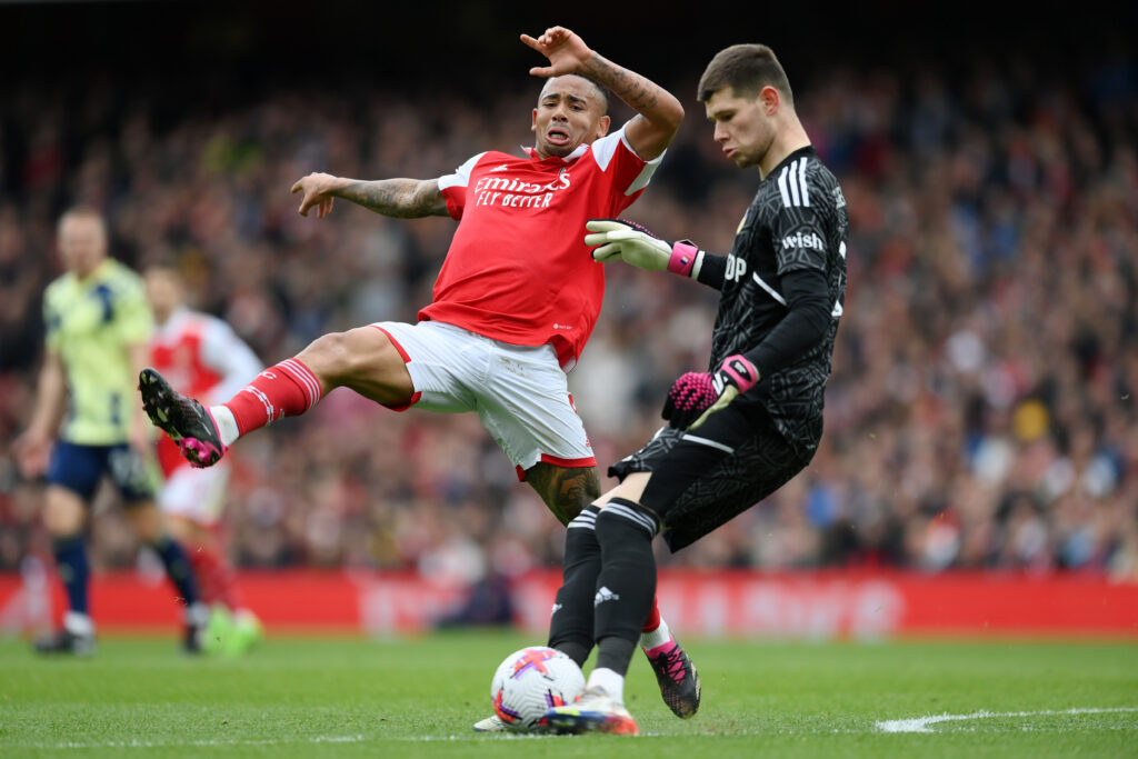 Illan Meslier of Leeds United clears the ball whilst under pressure from Gabriel Jesus of Arsenal during the Premier League match between Arsenal FC and Leeds United