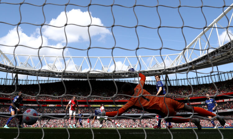 Illan Meslier of Leeds United looks on as Eddie Nketiah of Arsenal scores their side's second goal during the Premier League match between Arsenal ...