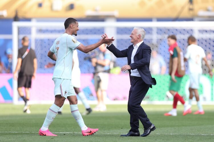 Didier Deschamps, Head Coach of France, celebrates with William Saliba #17 after the 2-0 victory during the FIFA World Cup 2026 Quarter Final match...
