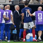 Didier Deschamps, Head Coach of France, checks on William Saliba #17 after he comes off with an injury during the FIFA World Cup 2026 Semi Final match between France and Spain at Dallas Stadium on July 14, 2026 in Arlington, Texas. (Photo by Shaun Botterill/Getty Images)