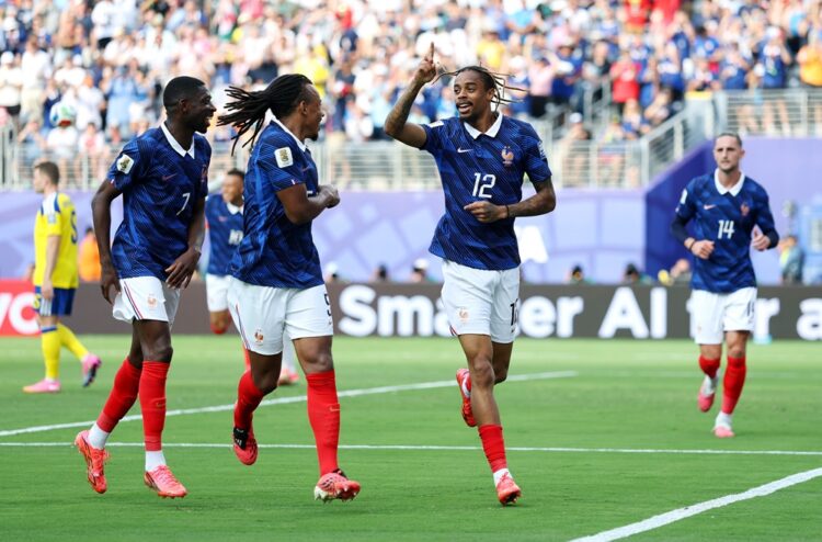 Bradley Barcola #12 of France celebrates with teammates after scoring the team's second goal during the FIFA World Cup 2026 Round Of 32 match betwe...