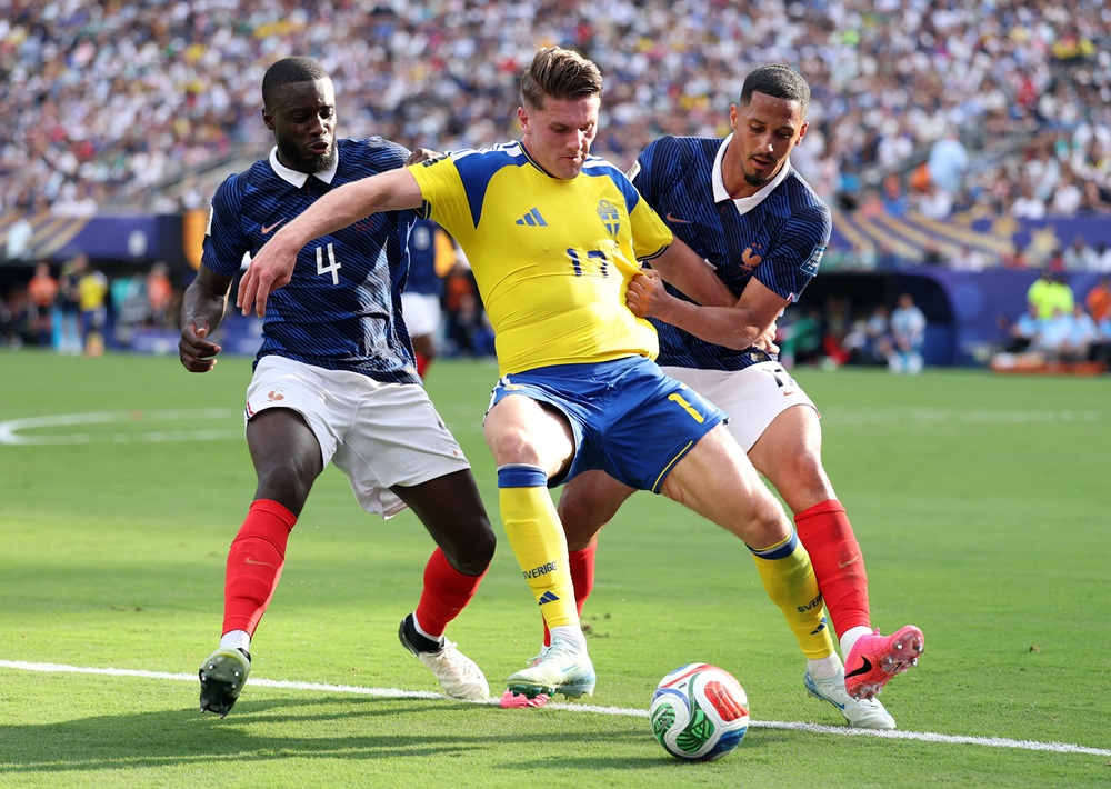 Viktor Gyokeres #17 of Sweden competes for the ball against Dayot Upamecano #4 and William Saliba #17 of France during the FIFA World Cup 2026 Round Of 32 match between France and Sweden at New York New Jersey Stadium on June 30, 2026 in East Rutherford, New Jersey. (Photo by Dan Mullan/Getty Images)