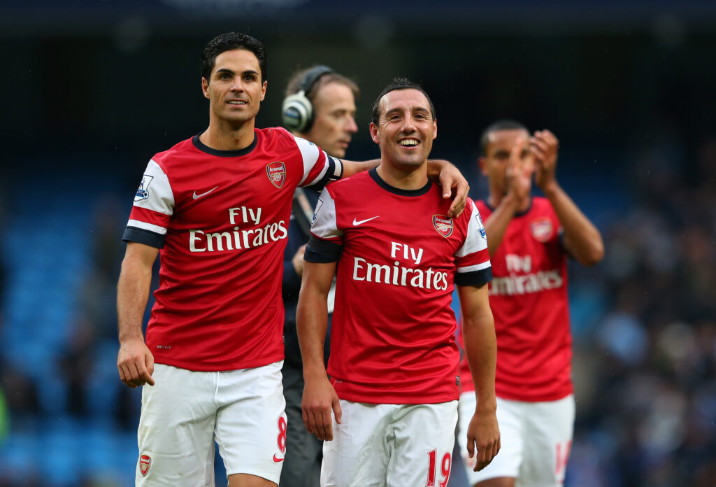 Mikel Arteta and Santi Cazorla of Arsenal at the finsl whistle during the Barclays Premier League match between Manchester City and Arsenal at Etihad Stadium on September 23, 2012 in Manchester, England