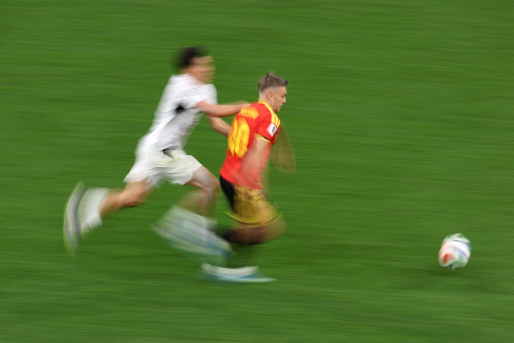 Leandro Trossard #10 of Belgium is challenged by Elijah Just #11 of New Zealand during the FIFA World Cup 2026 Group G match between New Zealand and Belgium at BC Place Vancouver on June 26, 2026 in Vancouver, British Columbia.