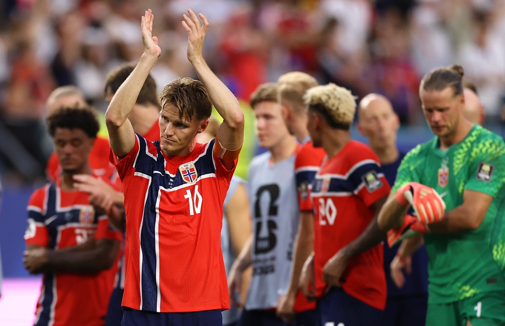 Odegaard set Arsenal World Cup record before elimination 1 Martin Odegaard #10 of Norway applauds fans after the 1-2 loss during the FIFA World Cup 2026 Quarter Final match between Norway and England at Mia...