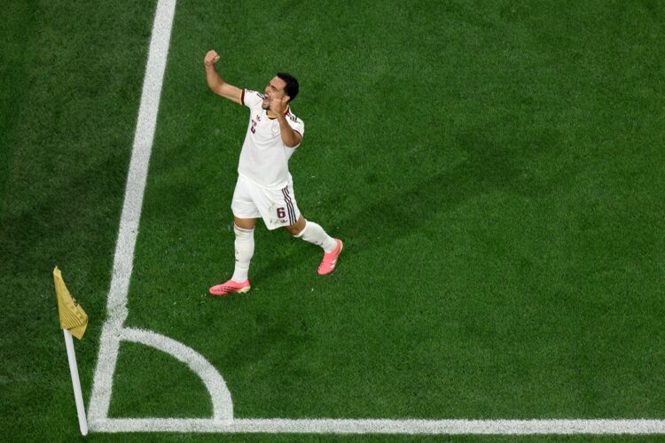 Mikel Merino #6 of Spain celebrates scoring his team's first goal during the FIFA World Cup 2026 Round of 16 match between Portugal and Spain at Da...
