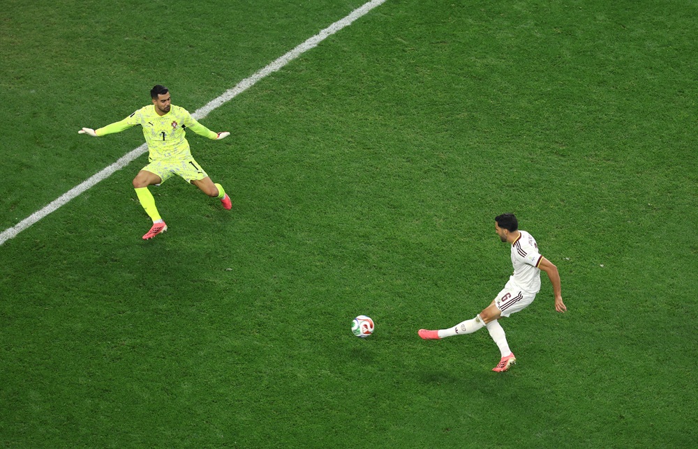 Mikel Merino #6 of Spain scores his team's first goal against Diogo Costa #1 of Portugal during the FIFA World Cup 2026 Round of 16 match between Portugal and Spain at Dallas Stadium on July 06, 2026 in Arlington, Texas. (Photo by Stacy Revere/Getty Images)
