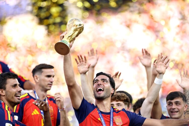 Mikel Merino #6 of Spain lifts the FIFA World Cup Winner’s Trophy after the team’s victory following the FIFA World Cup 2026 Final match between Sp...