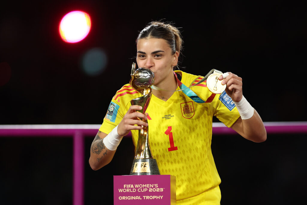 Misa Rodriguez of Spain kisses the FIFA Women's World Cup Trophy during the award ceremony following a 1-0 victory after the FIFA Women's World Cup Australia & New Zealand 2023 Final