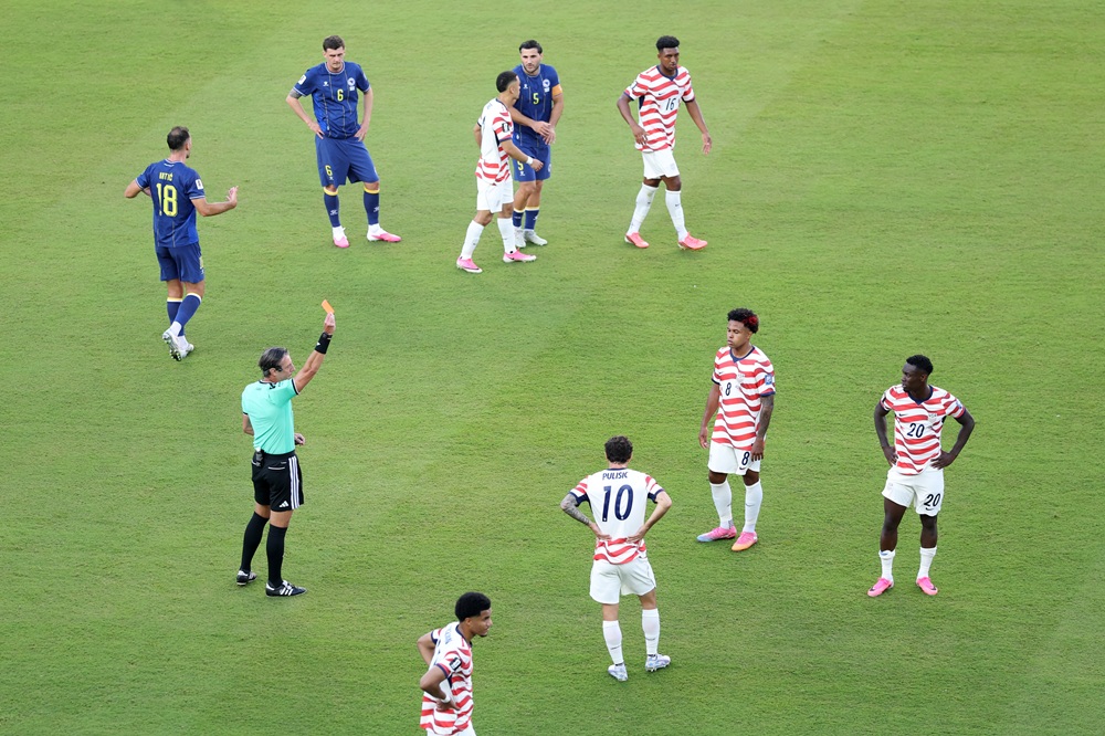 Referee Raphael Claus shows Folarin Balogun #20 of the United States a red card for a foul on Tarik Muharemovic #4 of Bosnia and Herzegovina during the FIFA World Cup 2026 Round of 32 match between USA and Bosnia and Herzegovina at San Francisco Bay Area Stadium on July 01, 2026 in Santa Clara, California. (Photo by Michael Steele/Getty Images)
