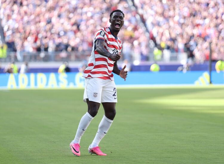 Folarin Balogun #20 of the United States celebrates scoring his team's first goal during the FIFA World Cup 2026 Round of 32 match between USA and ...