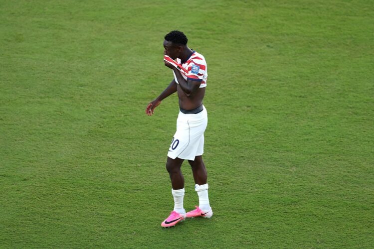 Folarin Balogun #20 of the United States reacts to receiving a red card for a foul on Tarik Muharemovic #4 of Bosnia and Herzegovina during the FIF...