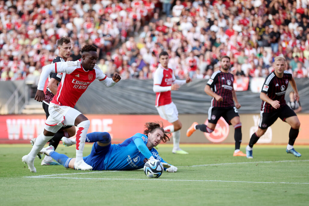 NUREMBERG, GERMANY - JULY 13: Folarin Balogun of Arsenal misses a chance past Carl Klaus of 1. FC Nürnberg during the pre-season friendly match between 1. FC Nürnberg and Arsenal FC at Max-Morlock Stadion on July 13, 2023 in Nuremberg, Germany. (Photo by Alex Grimm/Getty Images)